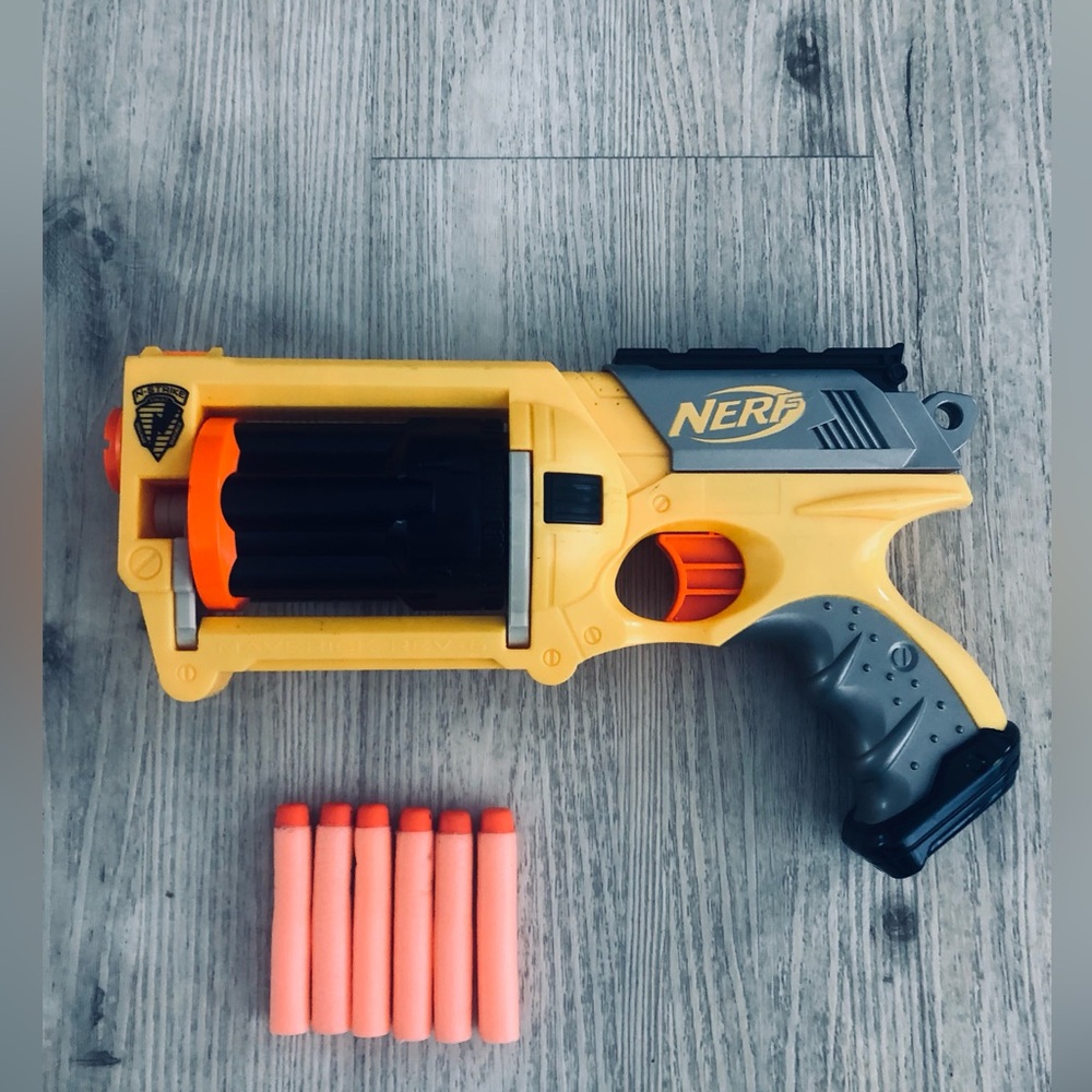 Nerf Maverick 6 Shooter 
Used
Everything Works 
With six used Darts
